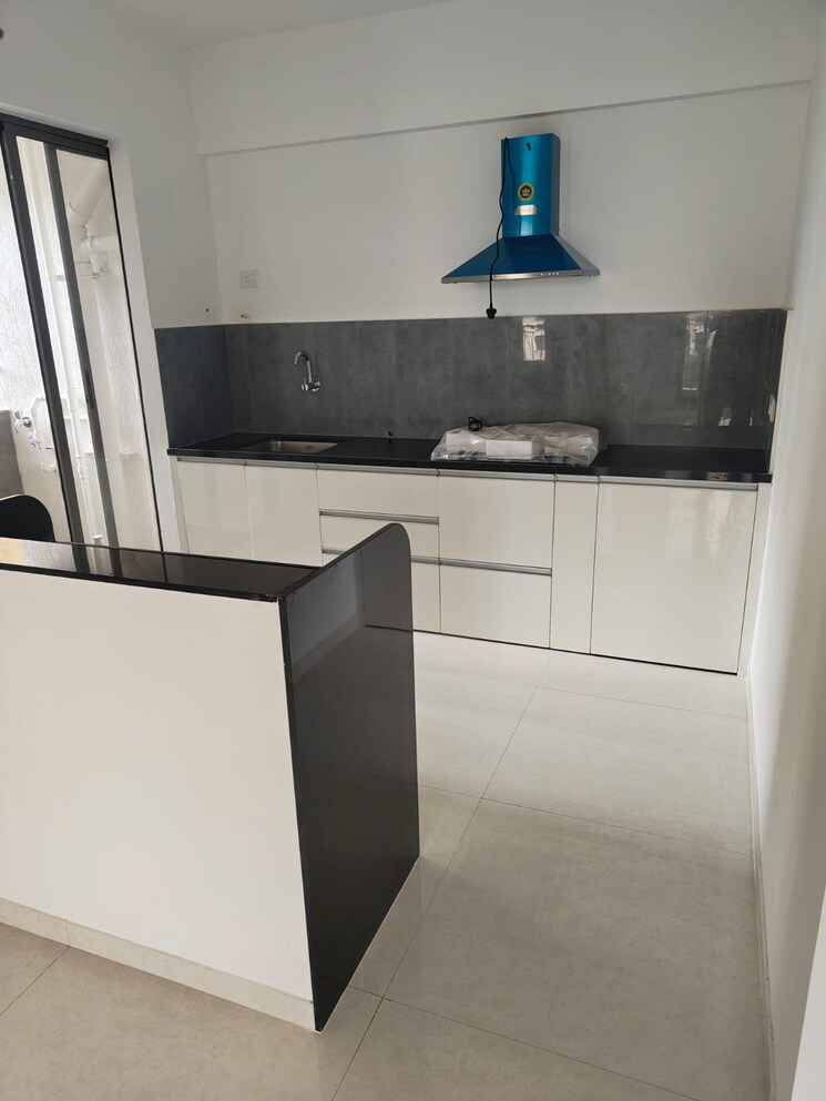 Kitchen, pride-world-city-wellington 2 Bedroom 780 Sq.Ft. Apartment In Charholi Budruk Pune 9008219