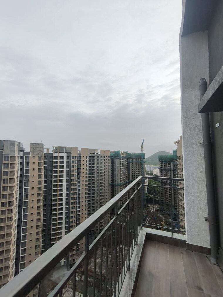 Balcony, pride-world-city-wellington 2 Bedroom 780 Sq.Ft. Apartment In Charholi Budruk Pune 9008219