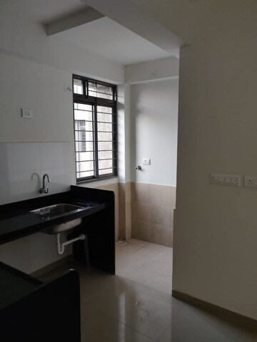 Kitchen in 3 BHK Apartment at Bhugaon – for Rent