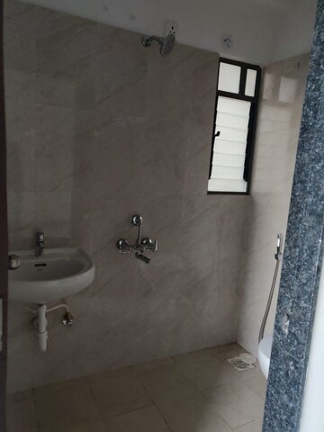 Bathroom in 3 BHK Apartment at Bhugaon – for Rent
