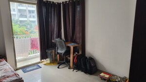 Living Room in 2 BHK Apartment at Paramount Altissimo, Wakad – for Sale