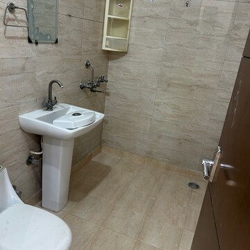 Bathroom in 2 BHK Apartment at Ashoka Enclave 3, Sector 35 – for Rent