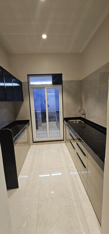 Kitchen in 2 BHK Apartment at Gajraj Bhoomi Lawns Phase I, Shilphata – for Sale