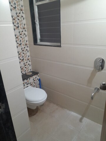 Bathroom in 2 BHK Apartment at Akshay Yash Grecia, Dhanori – for Rent