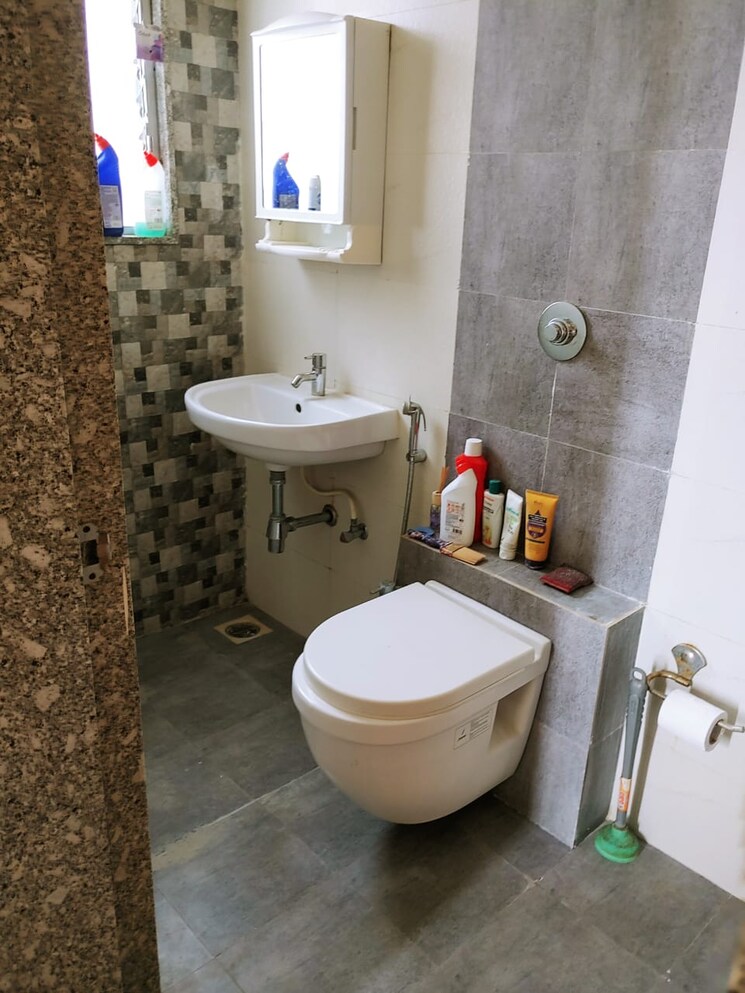 Bathroom, axis-paradigm-whistling-meadows 3 Bedroom 1500 Sq.Ft. Apartment In Paud Road Pune 9008782