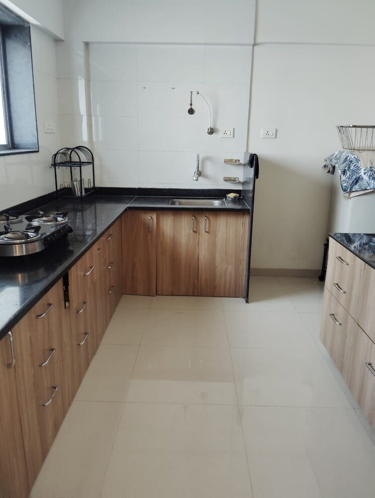Kitchen, axis-paradigm-whistling-meadows 3 Bedroom 1500 Sq.Ft. Apartment In Paud Road Pune 9008782