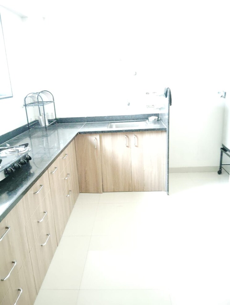 Kitchen, axis-paradigm-whistling-meadows 3 Bedroom 1500 Sq.Ft. Apartment In Paud Road Pune 9008782