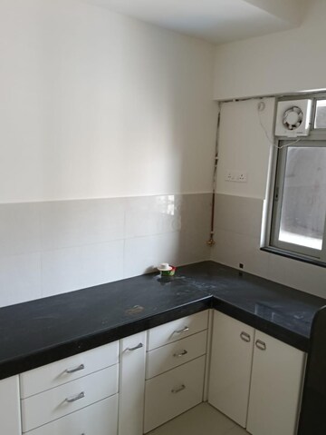 Kitchen in 2 BHK Apartment at Ashar Metro Towers, Vartak Nagar – for Rent