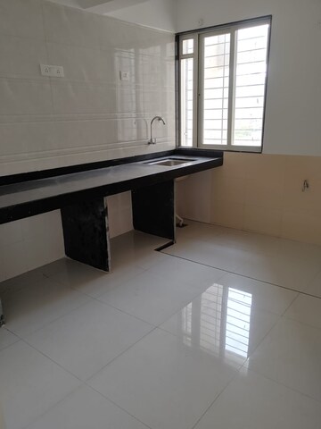 Kitchen in 1 BHK Apartment at Aryavart Star Altair, Bhugaon – for Rent