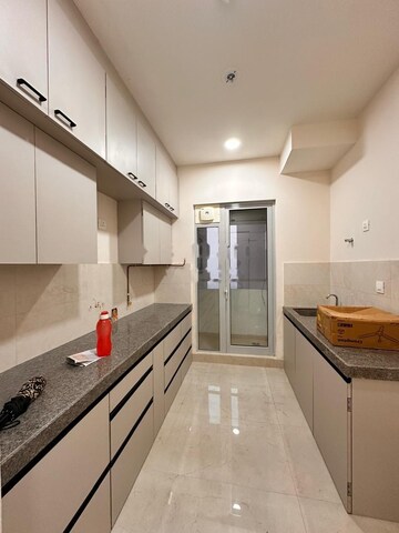 Kitchen in 2 BHK Apartment at Piramal Vaikunth, Balkum Pada – for Rent