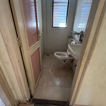 Bathroom in 1 BHK Apartment at Vighnaharta CHS, Chembur – for Sale