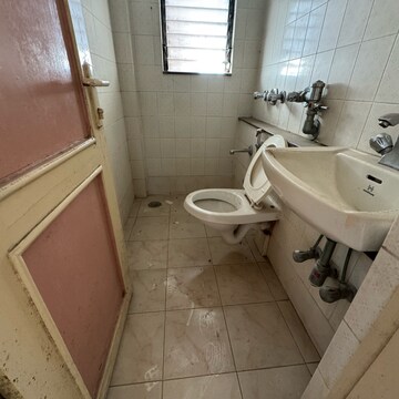 Bathroom in 1 BHK Apartment at Vighnaharta CHS, Chembur – for Sale