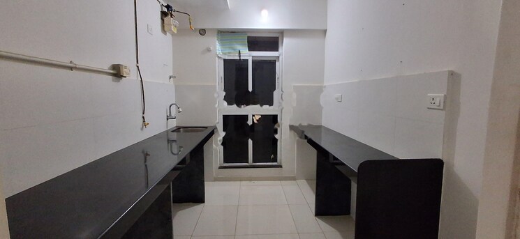 Kitchen, godrej-emerald 2 Bedroom 612 Sq.Ft. Apartment In Ghodbunder Road Thane 9008904