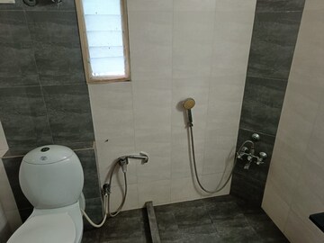 Bathroom in 4 BHK Apartment at Ahmedabad Cantonment – for Rent