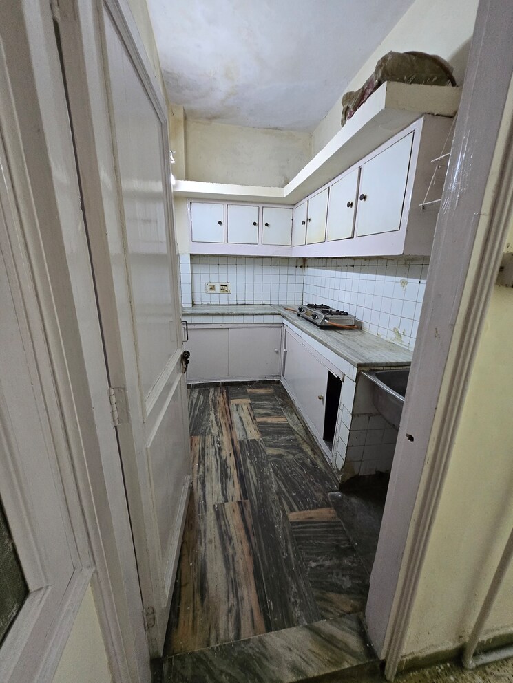 Kitchen, dayanand colony 2.5 Bedroom 900 Sq.Ft. Apartment In Dayanand Colony Delhi 9008974