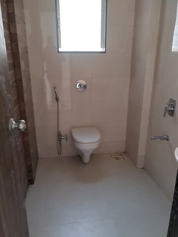 Bathroom in 3 BHK Apartment at Unique K Town, Kiwale – for Rent