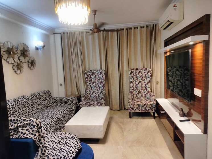 Living Room, ajnara-homes-phase-2 3 Bedroom 1599 Sq.Ft. Apartment In Sector 16b Greater Noida Greater Noida 9009061