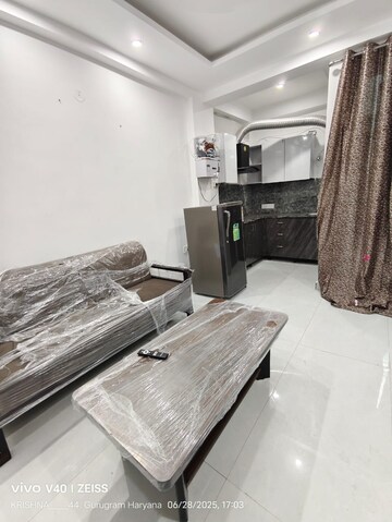 Living Room in 2 BHK Apartment at Logix Park, Sector 16 – for Rent