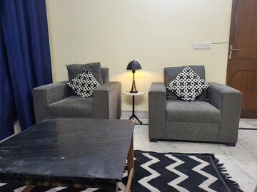 Living Room in 2 BHK Apartment at Logix Park, Sector 16 – for Rent