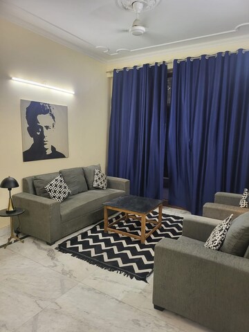 Living Room in 2 BHK Apartment at Logix Park, Sector 16 – for Rent