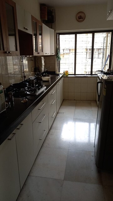 Kitchen in 4 BHK Apartment at Sunset 1 Co Operative Housing Society Ltd, Powai – for Rent