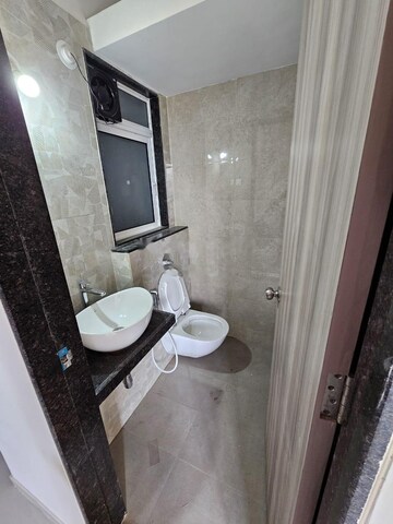 Bathroom in 1 BHK Apartment at Ashar Axis, Majiwada – for Rent
