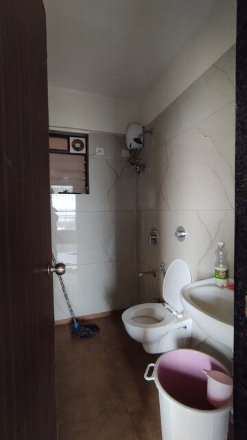 Bathroom in 2 BHK Apartment at Raunak City Sector 4 D3, Kalyan West – for Rent