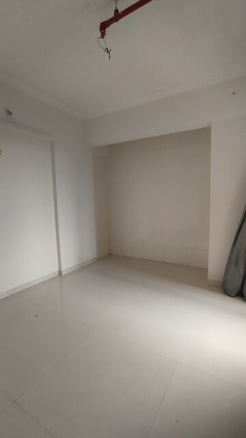 Room in 2 BHK Apartment at Raunak City Sector 4 D3, Kalyan West – for Rent