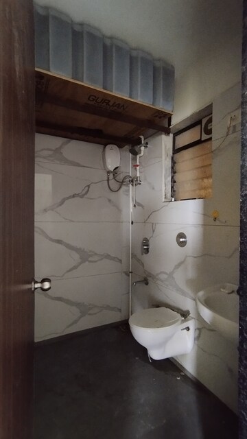 Bathroom in 2 BHK Apartment at Raunak City Sector 4 D3, Kalyan West – for Rent