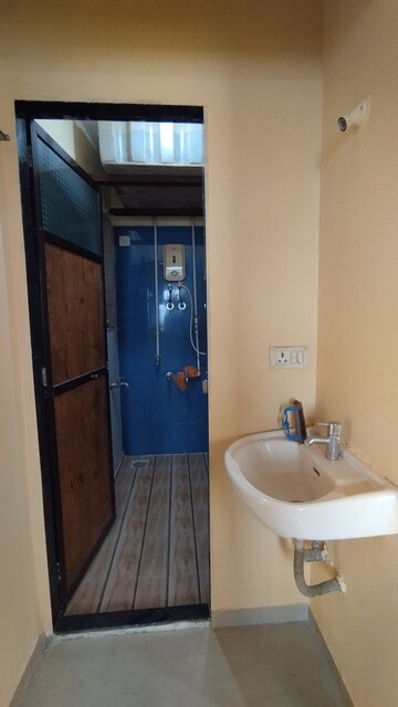 Bathroom in 1 BHK Apartment at Raunak City Sector 2 B7, Kalyan West – for Rent
