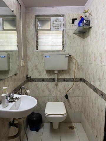Bathroom in 2 BHK Apartment at Sunrise Tower, Andheri East – for Rent