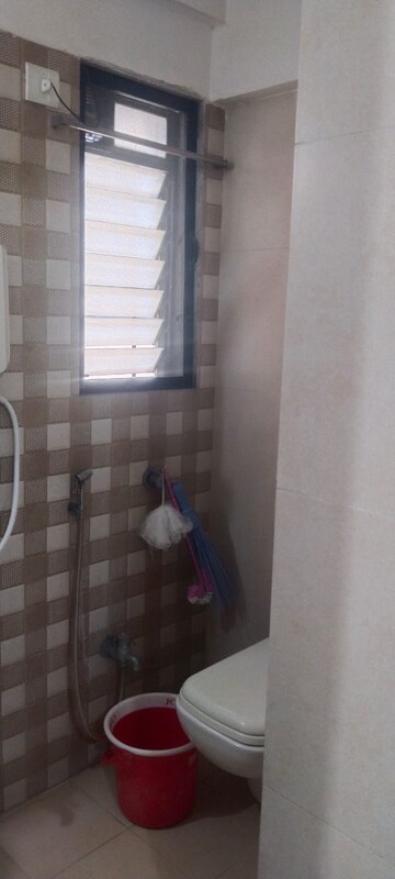Bathroom in 1 BHK Apartment at Unnathi Woods Phase 3, Ghodbunder Road – for Rent