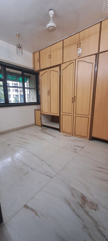 Bedroom in 1 BHK Apartment at Akshardham Apartment, Malad West – for Rent