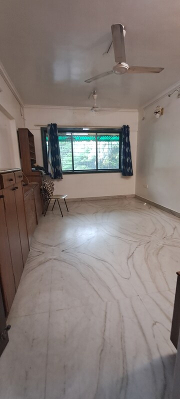Living Room in 1 BHK Apartment at Akshardham Apartment, Malad West – for Rent