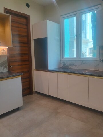 Kitchen in 4 BHK Apartment at Samridhi Daksh Avenue, Sector 150 – for Sale
