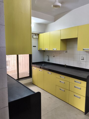 Kitchen in 2 BHK Apartment at Vile Parle West – for Rent