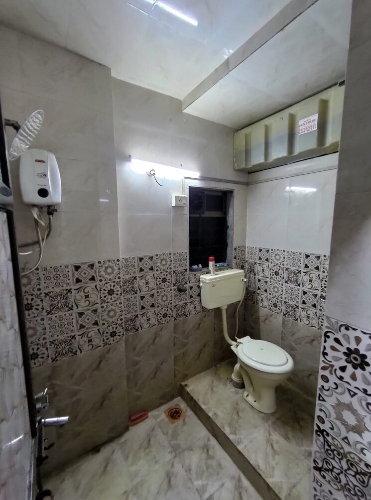 Bathroom, poonam-sagar-complex 2 Bedroom 900 Sq.Ft. Apartment In Mira Road Thane 9009840