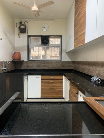 Kitchen in 1 BHK Apartment at Mohan Terrace, Borivali West – for Rent