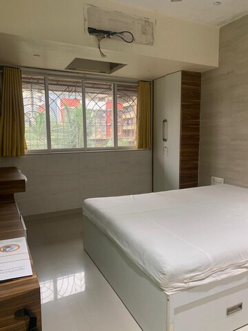 Bedroom in 1 BHK Apartment at Mohan Terrace, Borivali West – for Rent