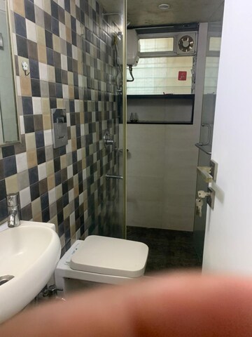 Bathroom in 1 BHK Apartment at Mohan Terrace, Borivali West – for Rent