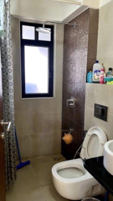 Bathroom in 2 BHK Apartment at Kanakia Hollywood, Versova – for Rent
