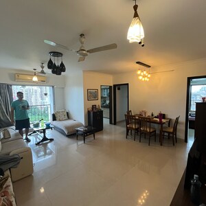 Living Room in 2 BHK Apartment at Woods Maple Tower, Khan Estate – for Sale