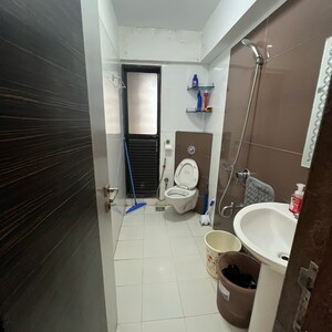 Bathroom in 2 BHK Apartment at Woods Maple Tower, Khan Estate – for Sale