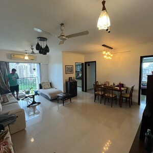 Living Room in 2 BHK Apartment at Woods Maple Tower, Khan Estate – for Sale