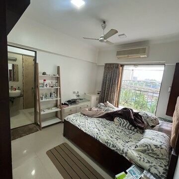 Bedroom in 2 BHK Apartment at Woods Maple Tower, Khan Estate – for Sale