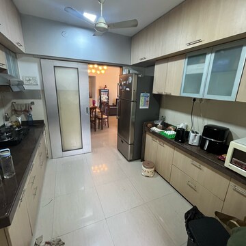 Kitchen in 2 BHK Apartment at Woods Maple Tower, Khan Estate – for Sale