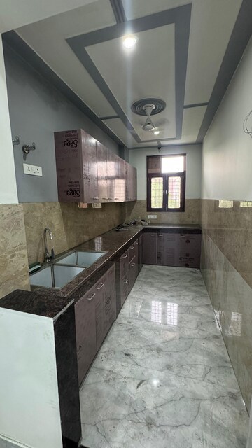 Kitchen in 2 BHK Builder Floor at Risland Sky Mansion, Chattarpur – for Rent