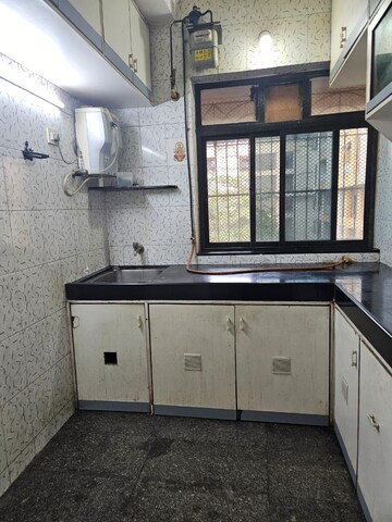Kitchen in 1 BHK Apartment at Cidco Millennium Tower, Sanpada – for Rent