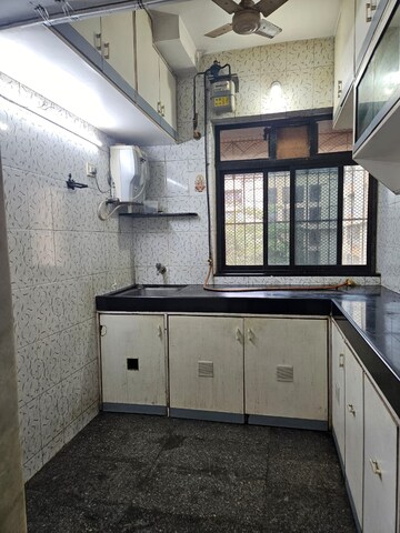 Kitchen in 1 BHK Apartment at Cidco Millennium Tower, Sanpada – for Rent