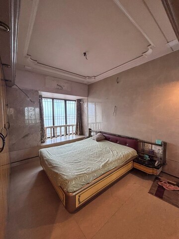 Bedroom in 2 BHK Apartment at Beach Queen Apartments, Andheri West – for Rent